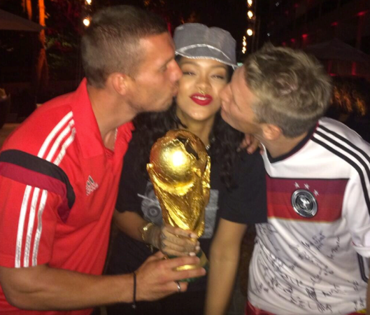 rihanna holding world cup trophy